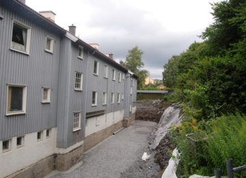Hus som illustrerer temaet om borettslag og sameiers ansvar for energisparing