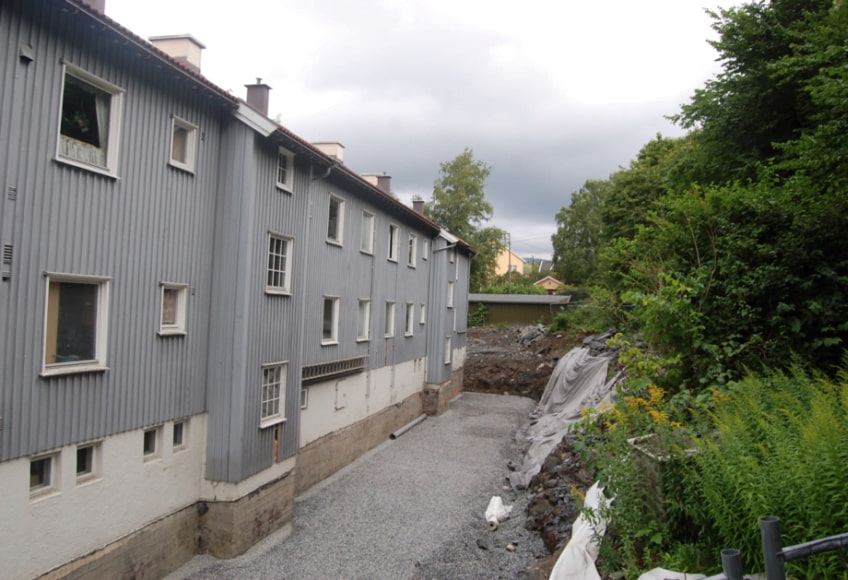 Hus som illustrerer temaet om borettslag og sameiers ansvar for energisparing